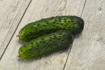 Ripe fresh green two cucumbers