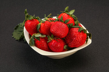 Ripe sweet strawberry with leaf