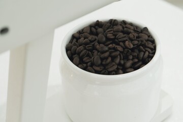 Coffee beans on the white bowl