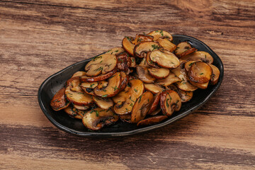 Roasted champignon with herbs and spices