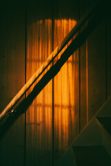 Obraz premium Late evening light hitting a wooden wall.