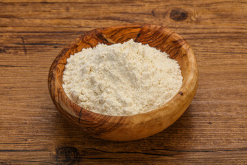 Wheat flour heap in the bowl