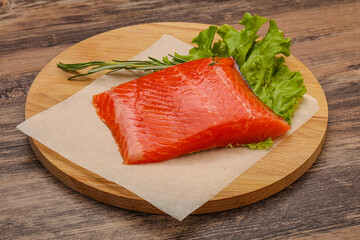 Salmon piece steak served rosemary