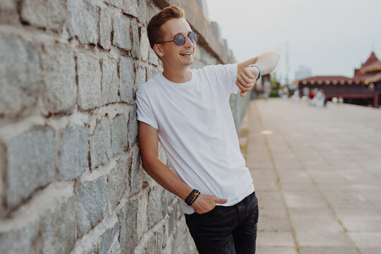 Man looks at the smartwatch