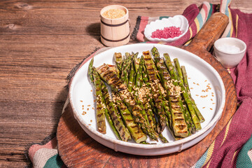 Ripe grilled asparagus. Rustic style arrangement, healthy food concept