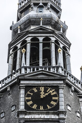 Amsterdam Old Church (Oude Kerk) - oldest building and oldest parish church, founded in 1213. Oude Kerk stands in De Wallen, now Amsterdam's main red-light district. Amsterdam, The Netherlands.