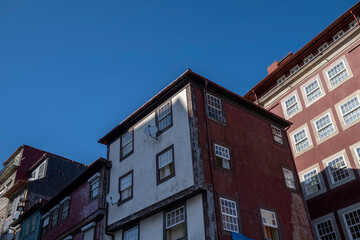 View of the residential buildings on one of the streets in the historical center of Porto, Portugal.