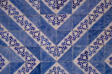 Traditional old tiles on the street Portuguese painted tin-glazed, azulejos ceramic tilework. Porto, Portugal.