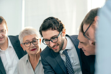 close up. smiling business colleagues discussing new ideas