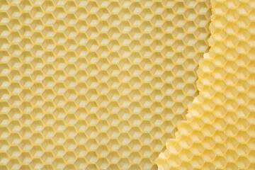 Natural beeswax texture. Honeycombs bee background. Wax base for honey bee rebuilding.
