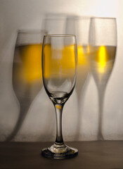 Concept, a glass and sparkling wine with glass reflections