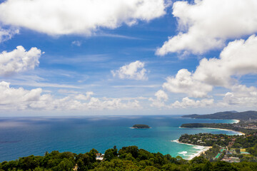 aerial view three beaches viewpoint in blue sky. .The popular landmark to see three beaches.Kata Noi beach Kata beach and Karon beach..aerial panorama view white cloud in blue sky cover the blue sea