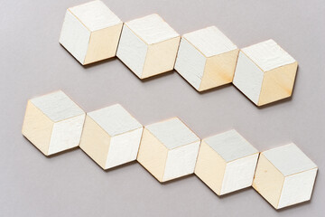 hand-painted (gray and white) painted trompe l'oeil (hexagonal) cubes on light gray background
