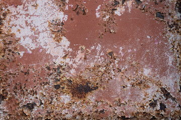 Red painted steel with rusty spots and cracks, grunge rusted metal texture
