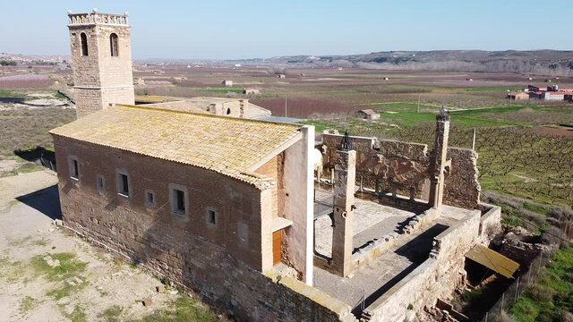 View from drone of ancient ruined monastery of Avinganya near Catalan city of Seros on spring sunny day, Spain