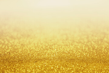 gold abstract bokeh background with twinkle and sparkle texture.