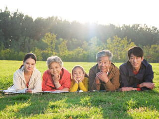 Happy family of five in the park