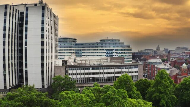 Beautiful aerial drone shot flying over Nottingham city at golden hour in England