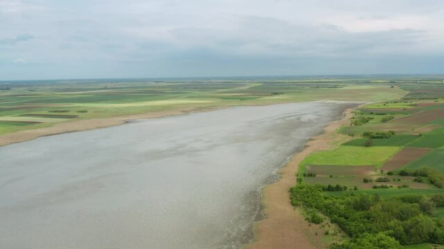 Open Water Lake Surrounded By Green Plains At Nature Reserve Slano Kopovo In Novi Becej, Serbia. aerial