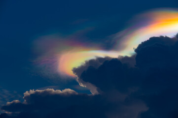 Iridescent Pileus Cloud on the sky