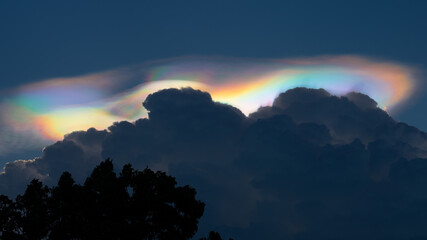 Iridescent Pileus Cloud on the sky