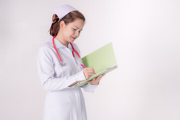Asian nurse look at notepad to see work schedule and her patient..