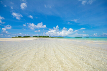 Fototapeta na wymiar Vast white sand beach, ocean and island in Kayangel state, Palau, Oceania