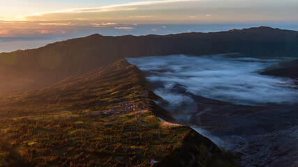 Mount Bromo twilight sky sunrise time with fog nature landscape background, Java, Indonesia.