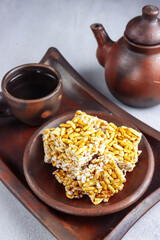 Kue Jipang, gipang, bipang or teng teng beras is Indonesian traditional cereal made from rice crispy with Sticky sugar.