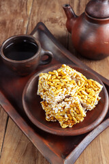 Kue Jipang, gipang, bipang or teng teng beras is Indonesian traditional cereal made from rice crispy with Sticky sugar.