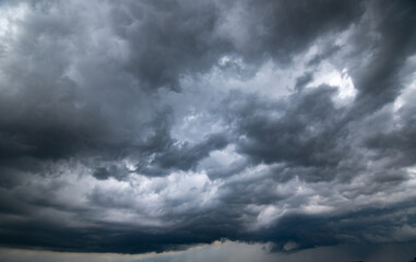 dark storm clouds with background,Dark clouds before a thunder-storm.