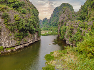 Fototapeta na wymiar the majestic scenery on Ngo Dong river in Tam Coc Bich Dong view from drone in Ninh Binh province of Viet Nam