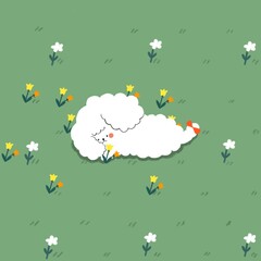 A big white furry dog with a red ribbon at his paw is laying on the grass fields with some white, yellow or orange flowers