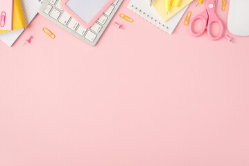 Top view photo of pink and yellow stationery reminders pens clips pins scissors stickers id...
