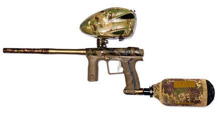 macro photo of camouflage paintball gun or marker with loader, long barrel and pressure tank on...