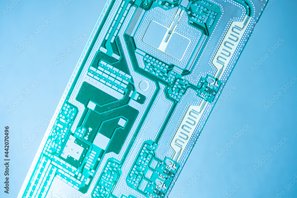 Poster the concept of radio electronics. electrical background with printed circuit board. the printed circ