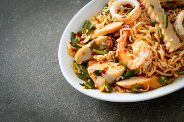 Instant noodle spicy salad with mixed meats