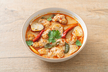 spicy boiled pork soup with mushroom - Tom Yum