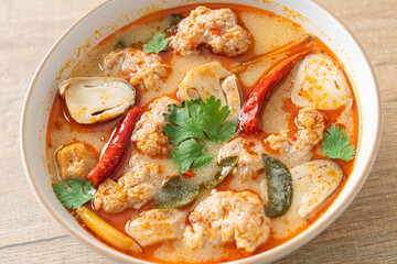 spicy boiled pork soup with mushroom - Tom Yum