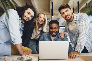 Group office portrait of happy diverse colleagues