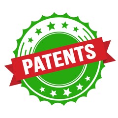 PATENTS text on red green ribbon stamp.