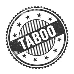 TABOO text written on black grungy round stamp.