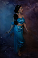 Beautiful princess closeup on the night background. Art photo.Jasmine princess cosplay.
