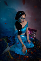 Beautiful princess closeup on the night background. Art photo.Jasmine princess cosplay.
