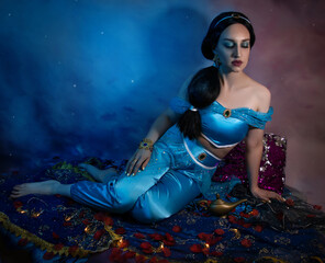 Beautiful princess closeup on the night background. Art photo.Jasmine princess cosplay.
