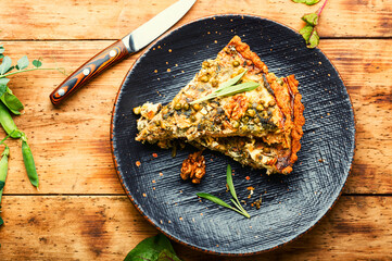 Open pie with herbs and green peas