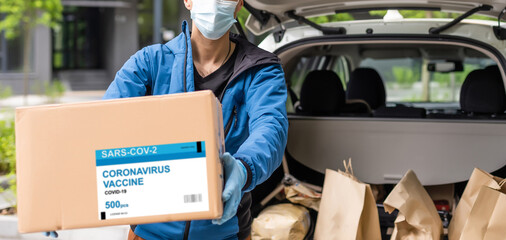 delivery medical box of vaccines from courier man receive package from professional delivery...