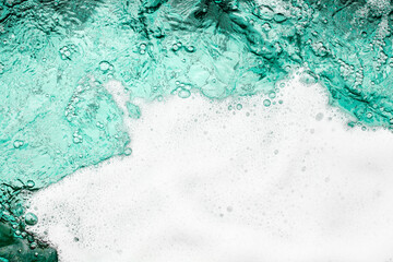 Blue sea water white foam texture background closeup, foamy ocean wave pattern, aqua bubbles surface, swimming pool backdrop, abstract summer sunny beach wallpaper, decorative frame border, copy space