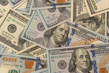 business concept pile of 100 dollar bills saving