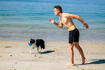 man running on the beach sand